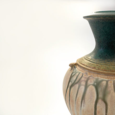 Detail of Symmetrical ceramic vessel with green upper and tan lower glazing and small handles by Richard Aerni at Cottage Curator - Sperryville VA Art Gallery