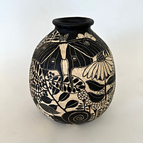 Black and white ceramic vessel with sgraffito scene featuring a crow, blackbird and various butterflies and insects by Carolyn Blazeck at Cottage Curator - Sperryville VA Art Gallery