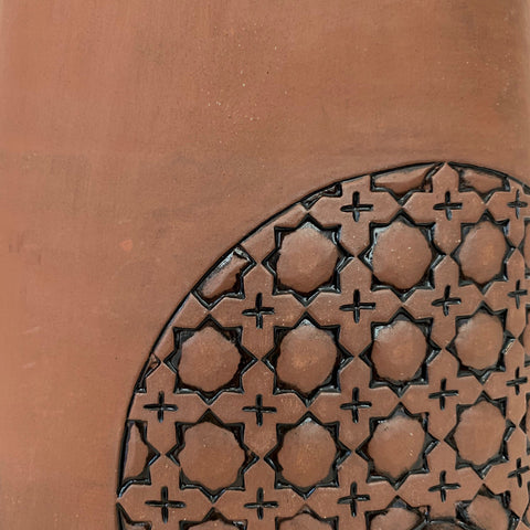 Detail of porcelain vessel in natural tan clay color with circle on the side with pattern by Yoshi Fujii at Cottage Curator - Sperryville VA Art Gallery