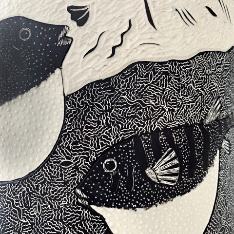 Detail of Porcelain vase with black and white carving of blowfish by Shirley Gromen at Cottage Curator - Sperryville VA Art Gallery