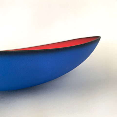 Detail of Blue earthenware bowl with red interior titled Illusion by Thomas Marrinson at Cottage Curator - Sperryville VA Art Gallery