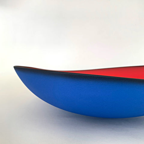 Detail of Blue earthenware bowl with red interior titled Illusion by Thomas Marrinson at Cottage Curator - Sperryville VA Art Gallery
