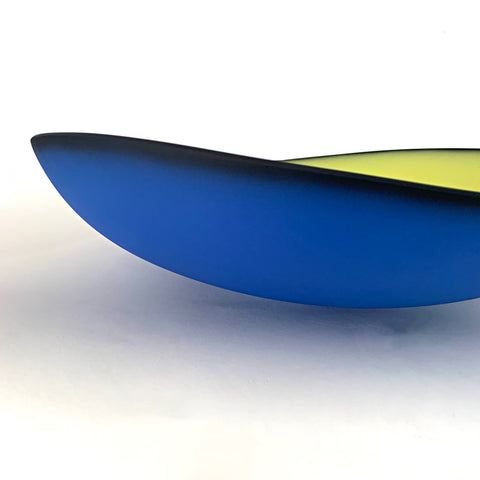 Detail of Blue earthenware bowl with yellow interior titled Illusion by Thomas Marrinson at Cottage Curator - Sperryville VA Art Gallery