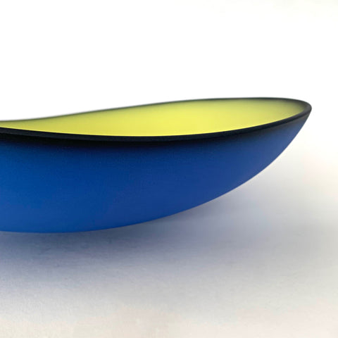Detail of Blue earthenware bowl with yellow interior titled Illusion by Thomas Marrinson at Cottage Curator - Sperryville VA Art Gallery