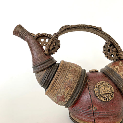 Detail of Clay teapot with steampunk style pieces and metal appearance in browns and reds by Steve Palmer at Cottage Curator - Sperryville VA Art Gallery