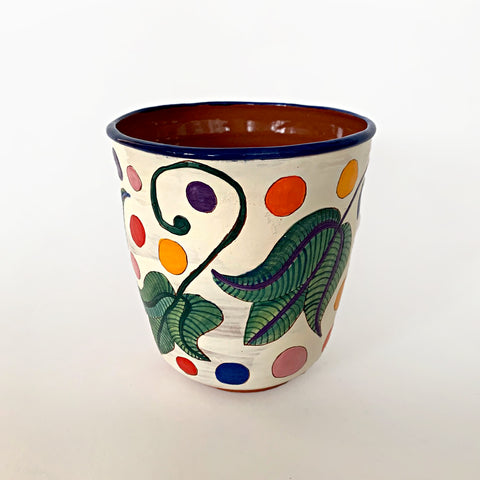 Ceramic pot with green, blue and purple plants and multi-colored polka dots with clay interior by Sara Schneidman at Cottage Curator - Sperryville VA Art Gallery